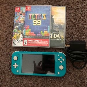 Nintendo switch with 3 games and charger works greats no problems no cracks